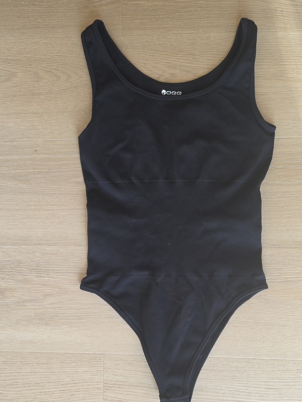 Black body of the OQQ brand For women